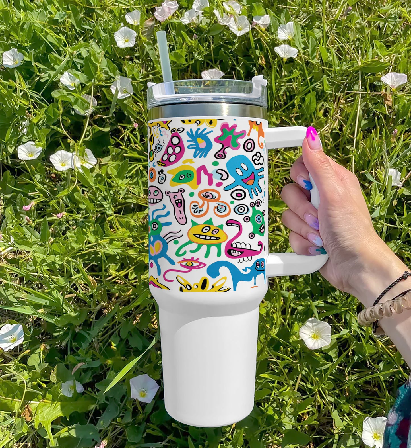 A colorful doodle art with many different colored monsters Printed 850ML with Lid Leak Proof Big Travel Tumbler with Handle and Straw