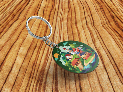 A Cartoon Illustration of a Fantasy Landscape with a Waterfall a Castle and a Mountain Printed Round Circle Shape Wooden Keyring with Chain