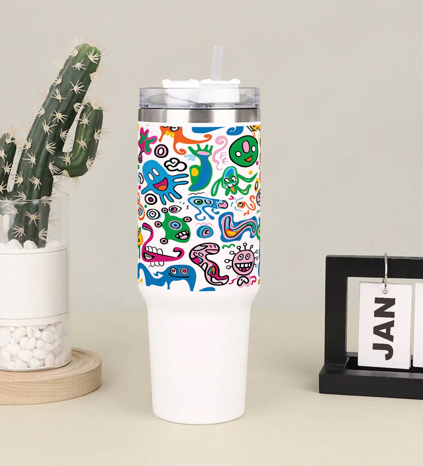 A colorful doodle art with many different colored monsters Printed 850ML with Lid Leak Proof Big Travel Tumbler with Handle and Straw